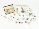 a box of jewelry that is sitting on a table