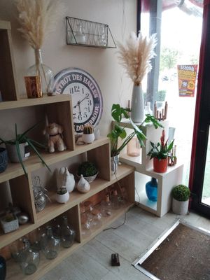 a room with shelves and a clock on the wall