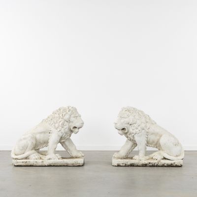 pair of white marble lions on marble bases