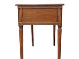 an image of a small wooden table with a drawer on it