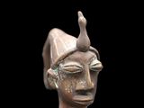 bronze statue of a woman with a crown on her head