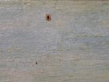 an image of a close up of a painting on a wooden surface