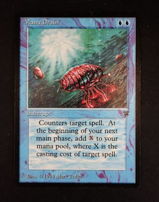 a close up of a card with a picture of a bug on it