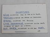 a picture of a business card with french writing on it