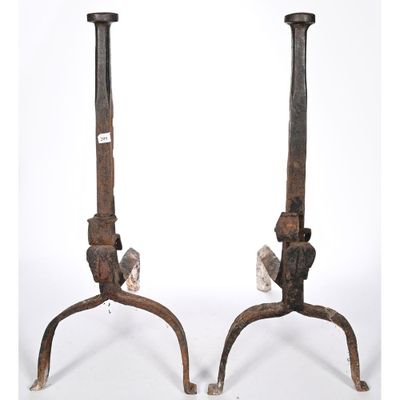 pair of antique cast iron candlesticks on cast iron bases