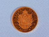 an image of a gold coin with a coat of arms on it