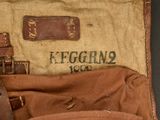 a brown bag with a brown handle and a brown bag with a brown handle and a brown bag with a brown handle and a brown bag with a brown