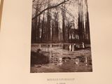 an old black and white photo of a group of people standing in a pond