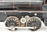a toy train that is sitting on a white surface