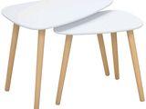 two white tables with wooden legs on a white background