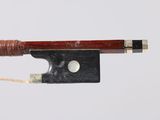 an image of a violin bow with a string attached to it