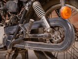 a close up of a motorcycle ' s front wheel and front tire