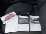 the contents of a car are sitting on the back seat of the car