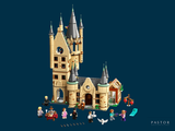 a lego hogwart castle on a dark blue background