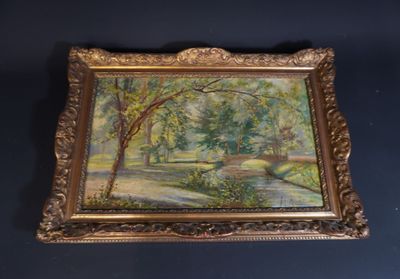 an oil painting of a river and trees in a gold frame