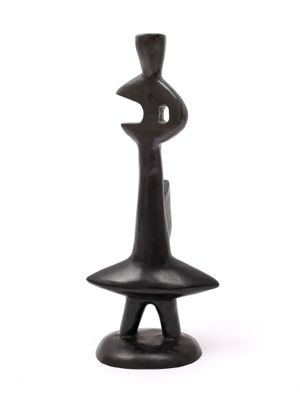 sculpture of a man with a hat on his head on a white background
