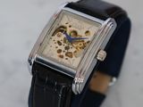 a watch that is sitting on a marble surface
