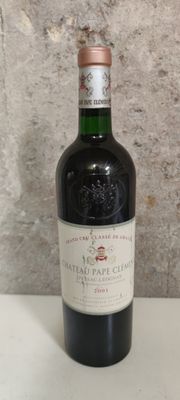 a bottle of wine that is sitting on a table