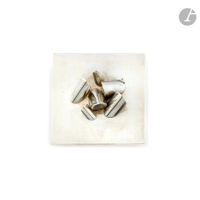 an image of a picture of a metal object on a white surface