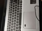 a laptop that is open on a table