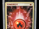 a close up of a pokemon trading card in a plastic case