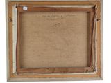 an old picture frame with a piece of paper in it