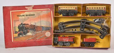 a box with a train set in it and a box with a train set in it
