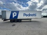 a picture of a semi trailer parked in a parking lot