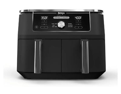 a black air fryer sitting on top of a white counter