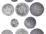 six different types of silver coins on a white background