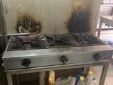 a stove that has a lot of food on it