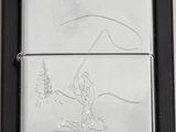 a zippo lighter with a picture of a man on a horse