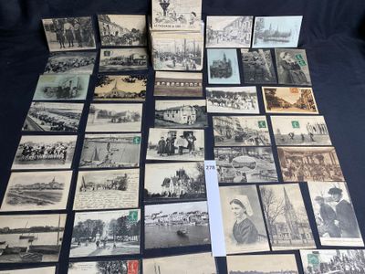 several old black and white photos of people and trains on a table