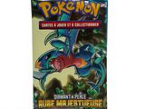a close up of a box of pokemon cards on a white surface