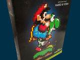a box that has a lego mario and toad on it