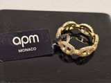 a close up of a ring with a tag on it