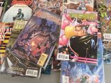 a lot of comic books sitting on a table