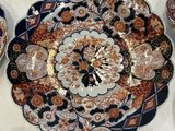 a lot of plates that are sitting on a table