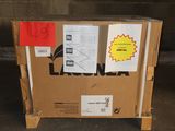 a cardboard box sitting on top of a pallet in a garage