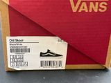 vans old skool shoes in a box on a table