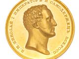 pièce d'or sur laquelle figure le portrait d'un homme