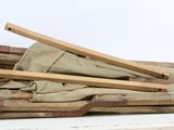 a pile of wood sticks sitting on top of a table