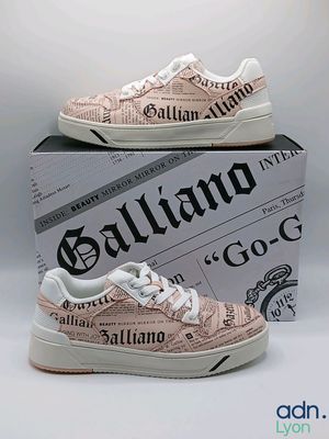 a pair of shoes that are on top of a box