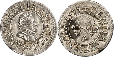 a silver coin with an image of a man on it