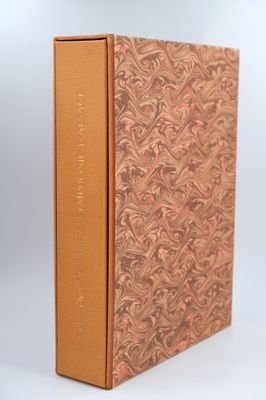 a book with a gold cover and a brown cover