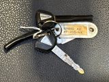 a bunch of keys sitting on top of a table