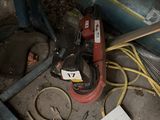 a small machine that is sitting on the floor