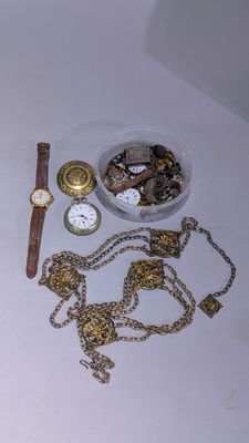 a table with a bunch of jewelry on it