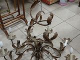 a chandelier that is sitting on the floor in the room