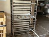 an image of a kitchen with a rack of baking pans